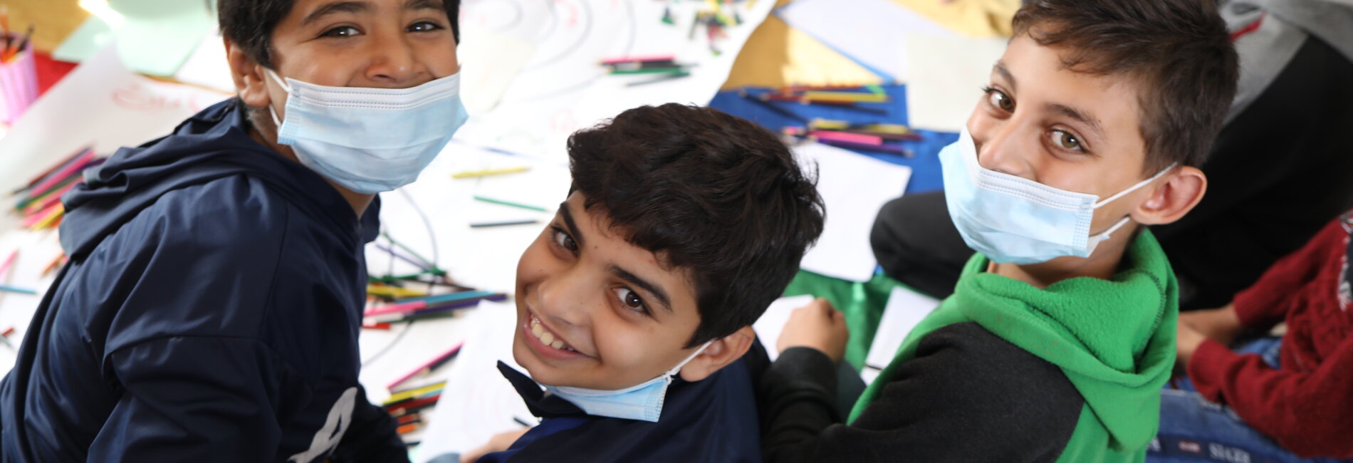 Palestinian boys at a UNICEF-supported family centre in the Gaza Strip, which offers integrated psychosocial support and protection to children affected by stress and psychosocial distress, including for children impacted by COVID-19.