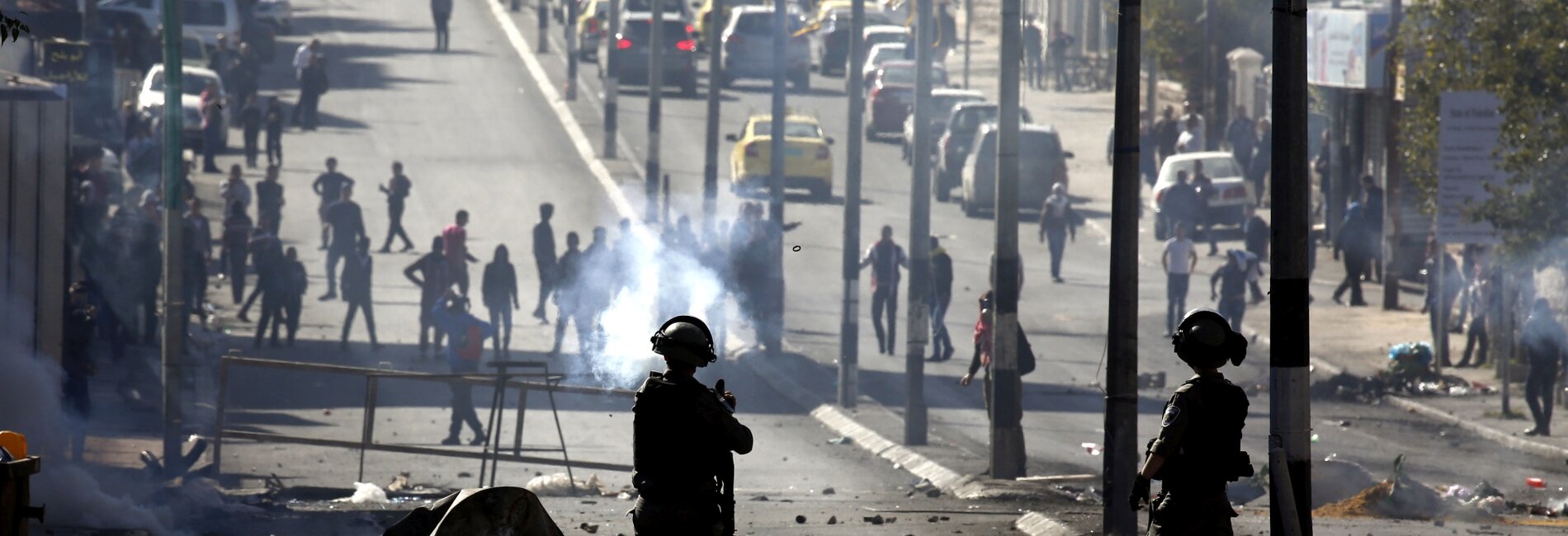 Clashes between Palestinians and Israeli forces during a protest against the US recognition of Jerusalem as Israel’s capital, Bethlehem,12 December 2017. 