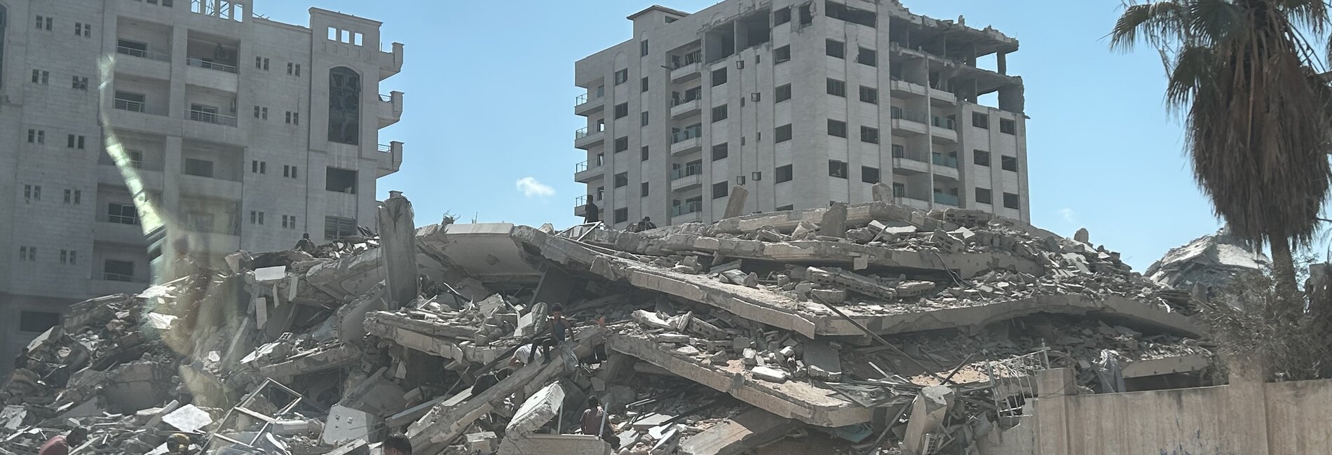 The destroyed Al Ro'ya tower in Gaza city. Photo by OCHA