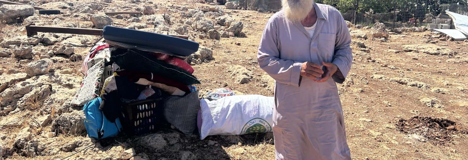 A newly displaced Palestinian shepherd from the Umm al-Hamam Bedouin community in Salfit governorate, after Israeli forces demolished several homes and animal shelters belonging to his family, undermining their livelihood. Photo by OCHA
