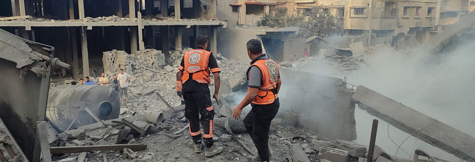 A Civil Defense team on a mission to rescue survivors and retrieve bodies from beneath the rubble in a residential area of Gaza. About 2,700 people, including some 1,500 children, have been reported missing. Eighteen Palestinian Civil Defense personnel have reportedly been killed since 7 October 2023. Photo by the Civil Defense, 2 November 2023.