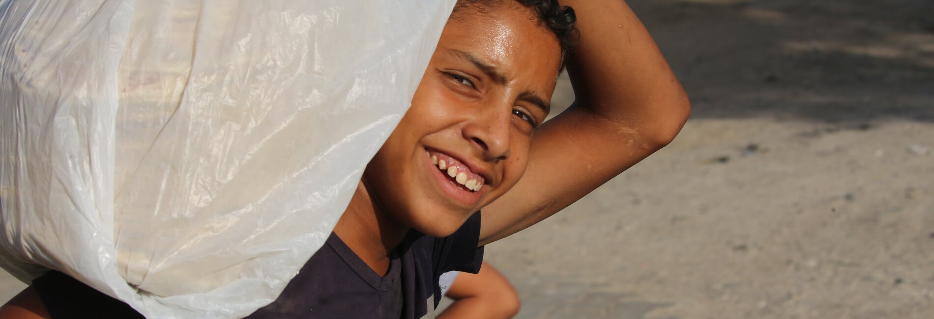 A Palestinian boy in Gaza following the declaration of a ceasefire. Photo by UNICEF