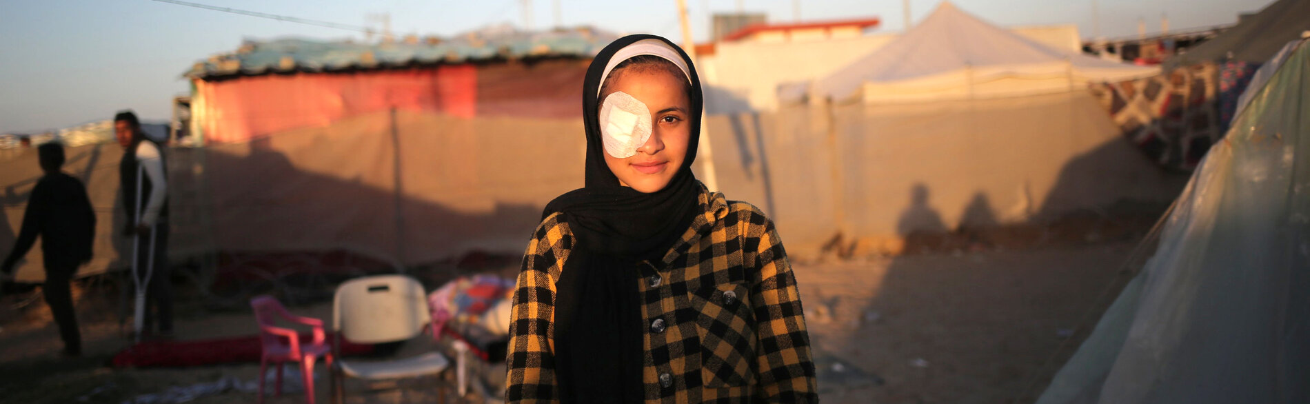 Abrar, 15-year-old, who was hit by shrapnel. “When my house was bombed and destroyed, two of my brothers were killed, and a third one was injured. Some shrapnel hit my right eye, causing weak eyesight and constant tears.” Photo by UNICEF
