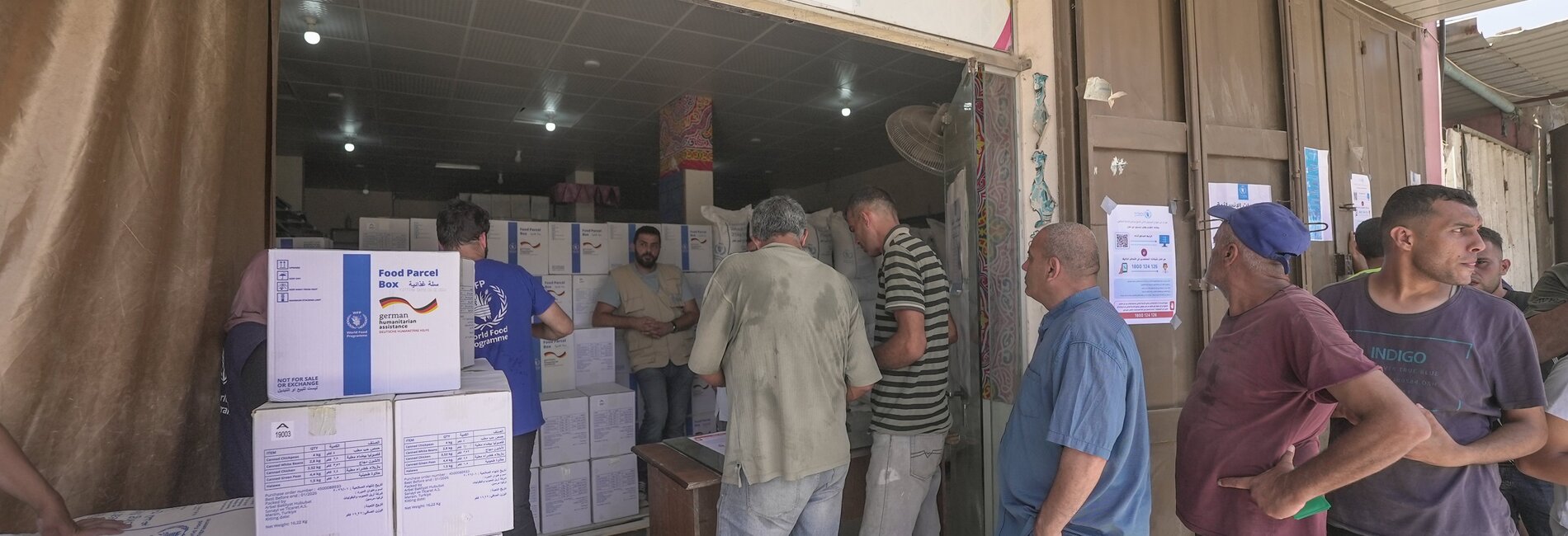 People queueing to receive food aid in Gaza. Photo by WFP