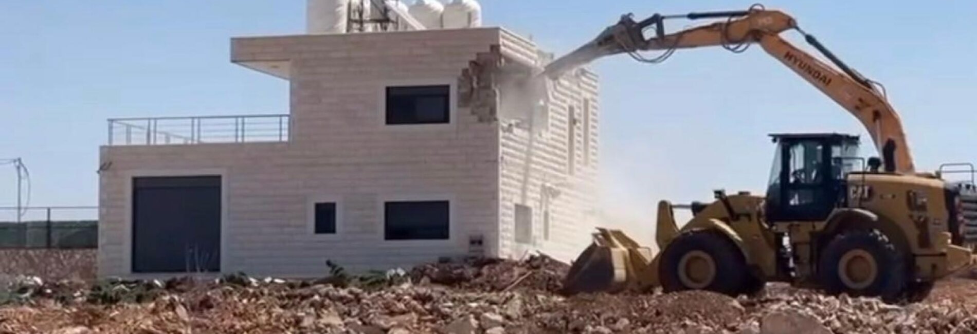 This two-storey residential building is one of 12 structures demolished by Israeli authorities in Area C of Al Judeira village, in Jerusalem governorate, citing the lack of Israeli-issued building permits, which are almost impossible for Palestinians to obtain. Photo by the community