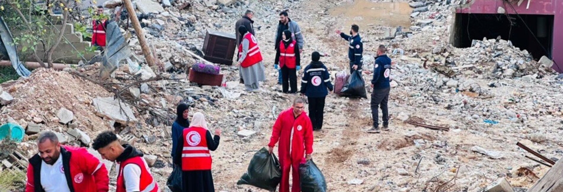 Palestine Red Crescent Society’s teams assist displaced families in retrieving their belongings from their homes in Nur Shams refugee camp in Turlkarm, following the receipt of demolition orders issued by Israeli forces. Photo by PRCS, 17 December 2025