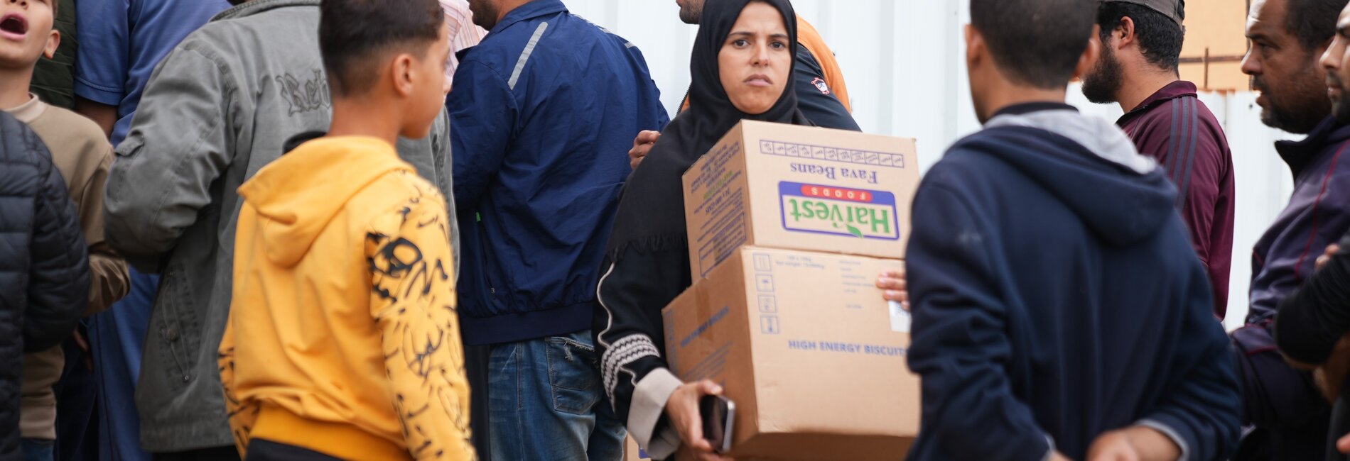 People queueing for food assistance. Across Gaza, most areas are off limits or unsafe for humanitarian organizations to reach and provide critical assistance. A recent survey has found that one in every three respondent families is experiencing severe hunger. Photo by the World Food Programme, 8 December 2023