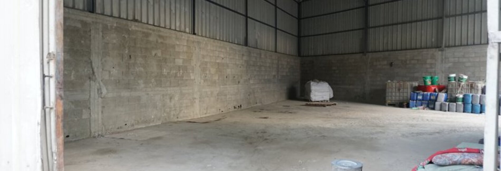 Empty warehouse of a cement mixing factory in eastern Gaza City, Nov 2016. 