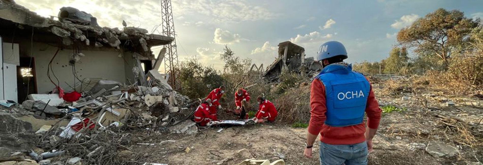 Hundreds of thousands of people remain in the area to the north of Wadi Gaza, which is largely cut off from humanitarian assistance and where food security assessments show the greatest needs. Rescue team recovering bodies in northern Gaza during a preliminary assessment led by the United Nations. Photo by OCHA   