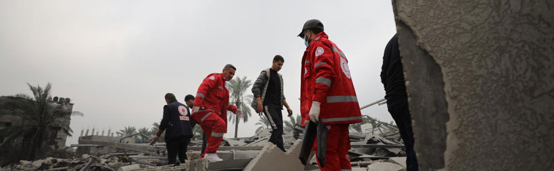 Two months on, the situation in Gaza is becoming apocalyptic. As hostilities expand, people are forced into increasingly confined areas of the south, and meaningful humanitarian efforts become nearly impossible. Photo of rescue teams in Deir al Balah by PRCS, 5 December 2023 