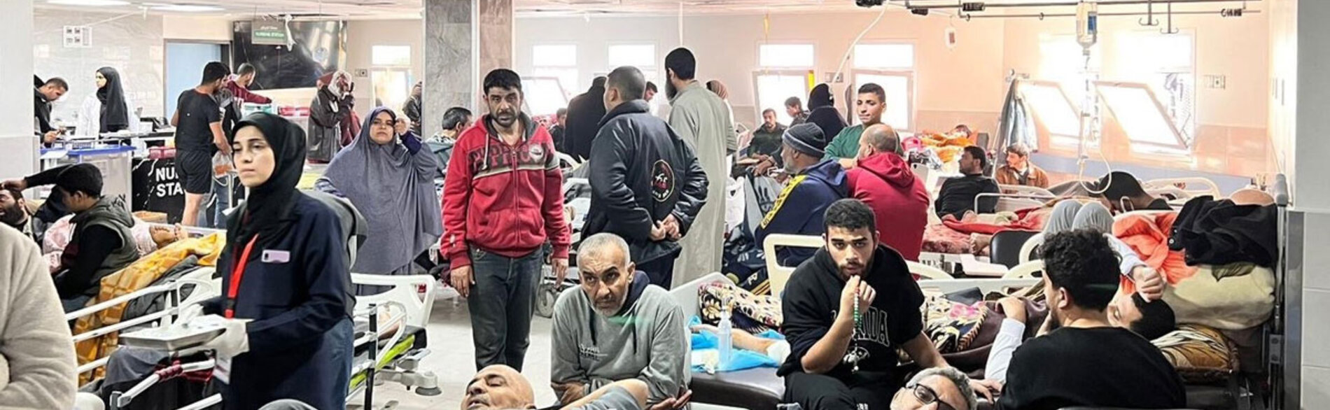 Nine out of 36 hospitals in Gaza are operational, although only partially. They are functioning at triple their bed capacity, grappling with no electricity and little fuel for backup generators, and confronting critical scarcities of essential supplies. Photo of Shifa by WHO, 16 December 2023