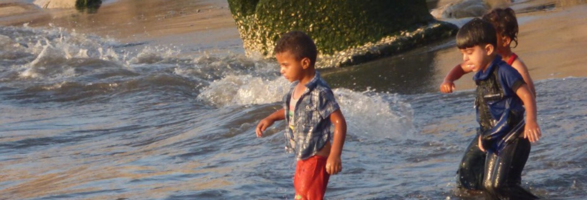 Polluted beach in Gaza city, June 2016. Photo by OCHA