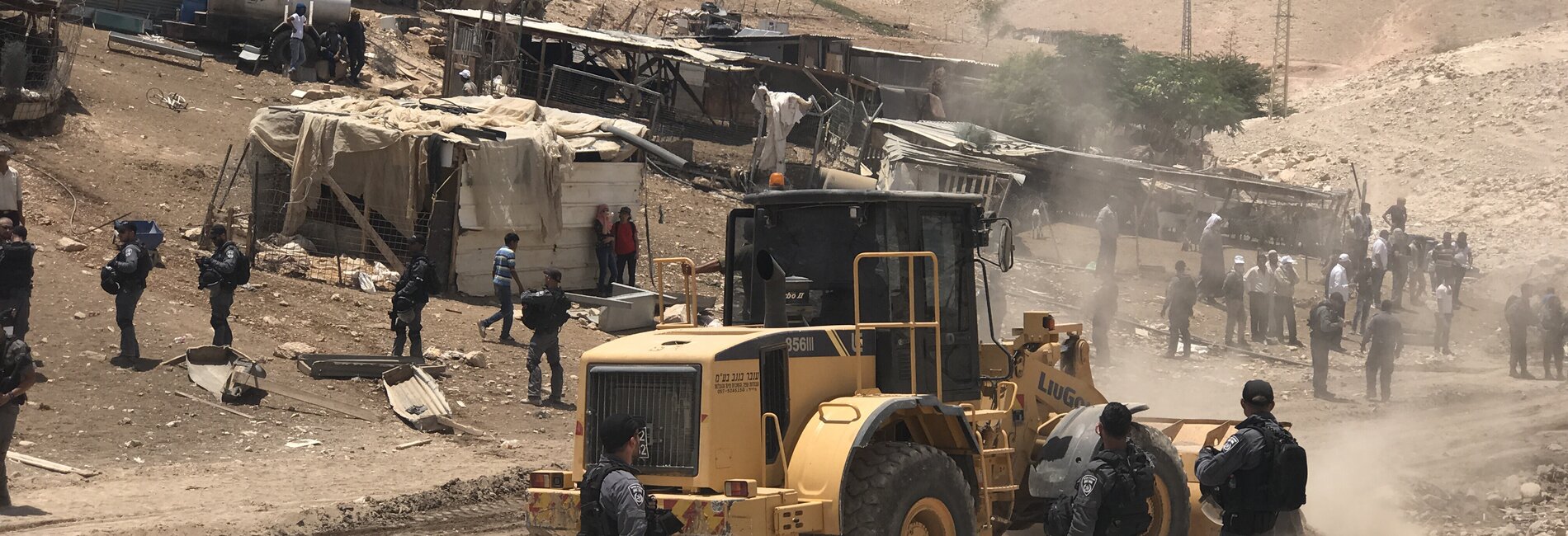 Israeli forces leveling land next to Khan Al Ahmar, in preparation for the demolition of the community, 4 July 2018. © Photo by JFF