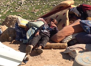 A boy who lost his home in Ein Ar Rashash, 15 February 2016 A boy who lost his home in Ein Ar Rashash, 15 February 2016