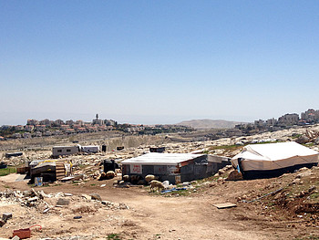 Jabal Al Baba (Jerusalem), a Bedouin community at risk of forcible transfer. In the background Ma'ale Adummim settlement. Photo by OCHA Jabal Al Baba (Jerusalem), a Bedouin community at risk of forcible transfer. In the background Ma'ale Adummim settlement. Photo by OCHA