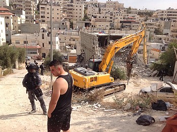 Demolition of a four-storey building in Al-’Isawiya in East Jerusalem. 11 July 2017. © Photo by OCHA Demolition of a four-storey building in Al-’Isawiya in East Jerusalem. 11 July 2017. © Photo by OCHA