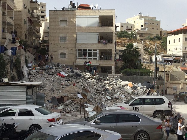 Three-storey  building demolished in Al Isawiya, East Jerusalem, 1 May 2018. © Photo by OCHA