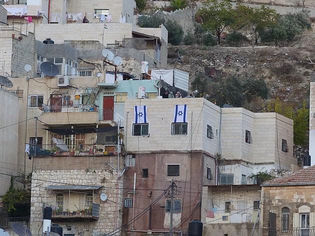 Suhaib’s house in Silwan, East Jerusalem, next to an Israeli settlement. ©  Photo by OCHA.