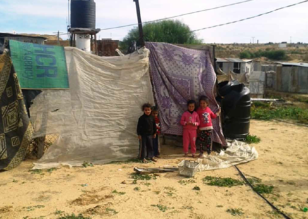 Makeshift shelter housing a displaced family in Gaza city, January 2016.
