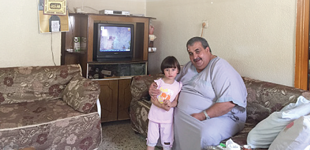 Mazen Kirresh and his granddaughter, May 2016