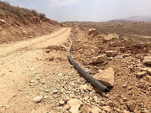A water pipe that formed part of a water network in Khirbet Yarza that was partially dismantled and confiscated on 8 August 2016 by the Israeli authorities, affecting drinking water supply to nearly 1,000 Palestinians in five communities.