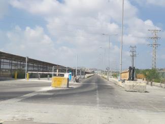 Road and pedestrian corridor leading to the terminal of the Erez Crossing, August 2019. 