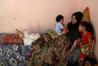 A women injured in a demonstration at the fence in Gaza. © Photo by Women Affairs Centre.