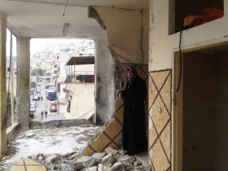 House demolished on punitive grounds in Silwan (East Jerusalem) on 19 November 2014. Photo by OCHA