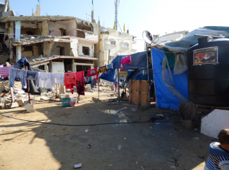 Houses destroyed as a result of the Israeli offensive on Gaza in 2014 in Shajaiyeh area. Photo by OCHA