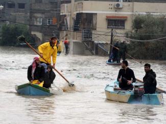 Civil Defense staff evacuating people from Al Nafaq area in Gaza City, 2013. Photo by Shareef Sarhan\UNRWA