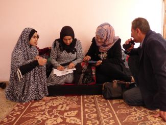 OCHA team surveying a displaced family in Rafah, December 2015