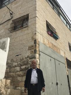 Mr. Sabbagh standing in front of the family house. December 2018. ©  Photo by OCHA