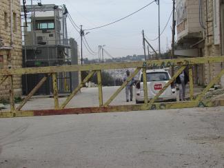 Temporary International Presence in Hebron (TIPH) at Israeli manned checkpoint (H2) Hebron. February 2018. ©  Photo by OCHA