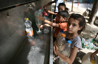 Tap of desalinated water in Rafah, Gaza Strip, 1 July, 2014. Photo by UNICEF/ElBaba