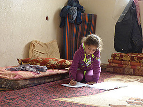 Displaced Palestinian girl in temporary accommodation in Gaza. © Photo by OCHA, February 2015. Displaced Palestinian girl in temporary accommodation in Gaza. © Photo by OCHA, February 2015.