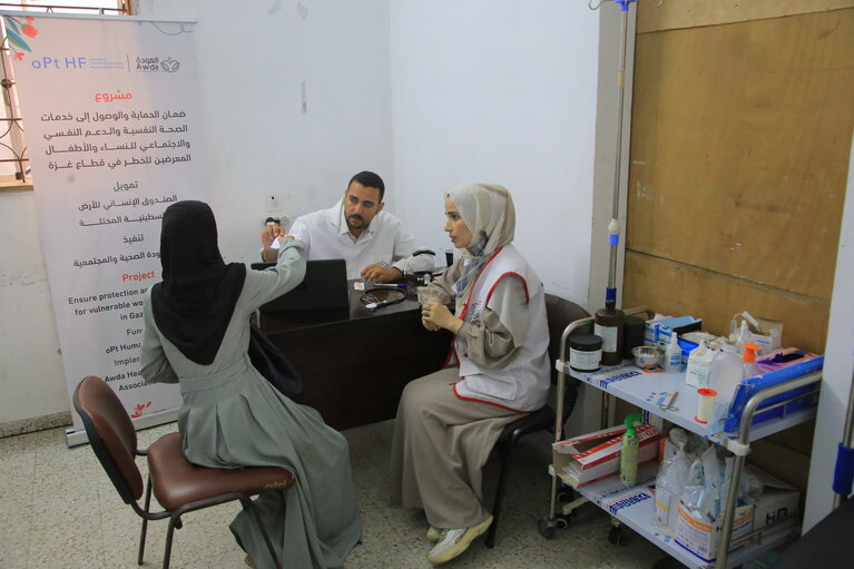 AWDA team providing psychosocial support to women in Gaza, 2023. Photo by AWDA. (Sara and her children are not pictured.)
