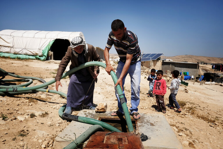 Palestinians in an Area C community of the West Bank not connected to the water grid. Archive picture by OCHA
