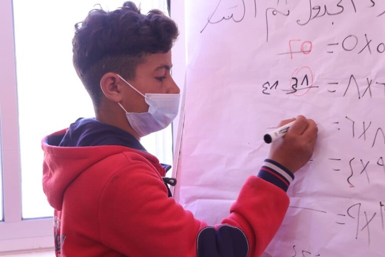 “Going back to school was my decision. I feel strong and proud of myself for doing it,” 13-year-old Walid, Gaza.