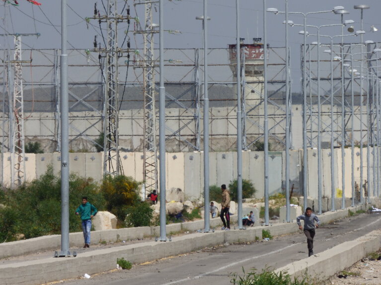 Palestinian youth near the Israeli Erez Crossing in the northern Gaza Strip. Archive picture, March 2016.