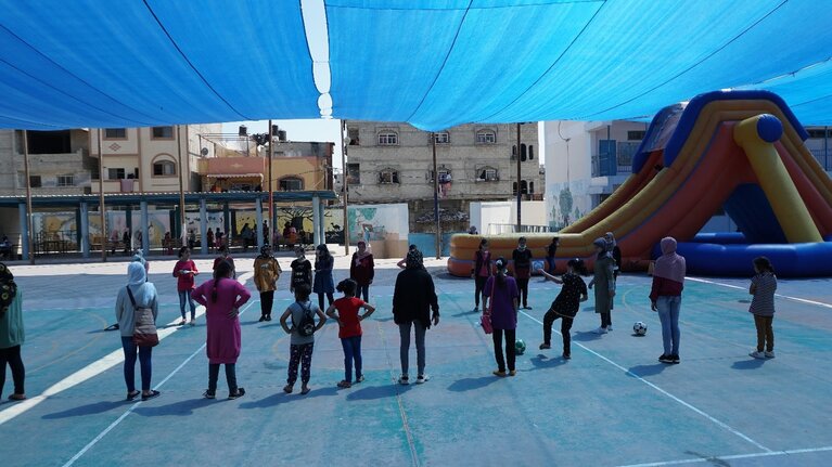 The football corner where cooperation and team building are practiced, 5 July 2021. Photo by OCHA.