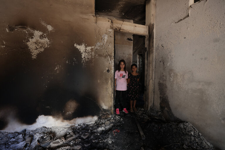 Girls in a damaged house in the Jenin Refugee Camp. Photo by UNICEF, 5 July 2023