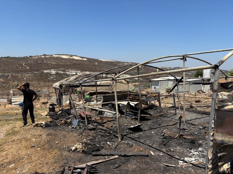 A boy from Sarra village following a settler attack that involved arson, physical assault and shooting by Israeli forces who followed the settlers. Photo by OCHA 