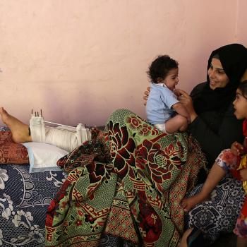 A women injured in a demonstration at the fence in Gaza. © Photo by Women Affairs Centre.