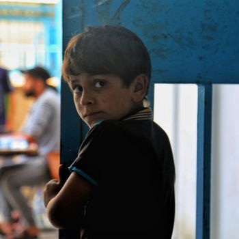 A Palestinian boy from a family seeking protection at an UNRWA school in Gaza during the May 2021 escalation of hostilities. © Photo by Mohammad Lubbad