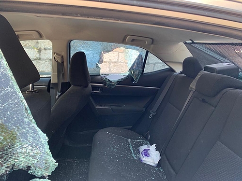 Car damaged in East Jerusalem clashes, April 2021. Photo by Tanya Habjouqa for OCHA Car damaged in East Jerusalem clashes, April 2021. Photo by Tanya Habjouqa for OCHA