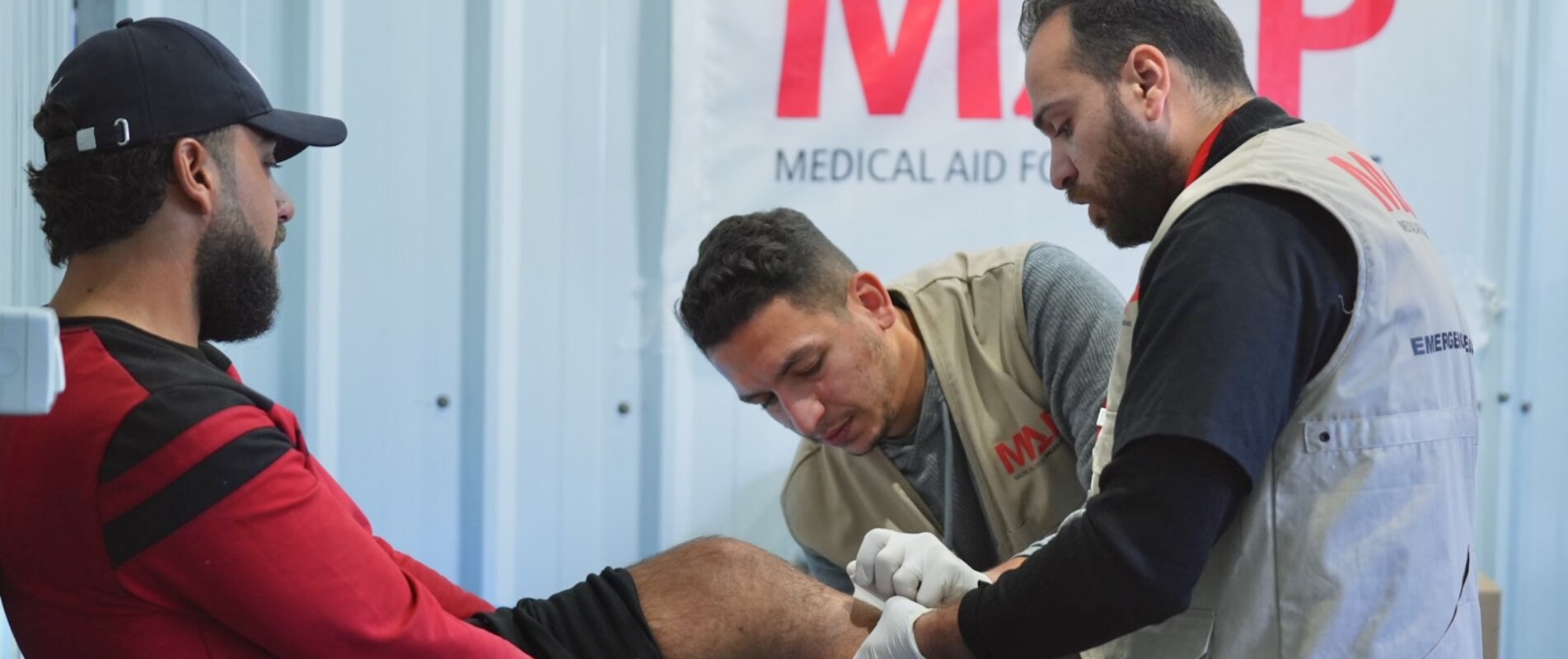 Ibrahim with a Medical Aid for Palestinians team. Photo by Palm Media for Medical Aid for Palestinians 