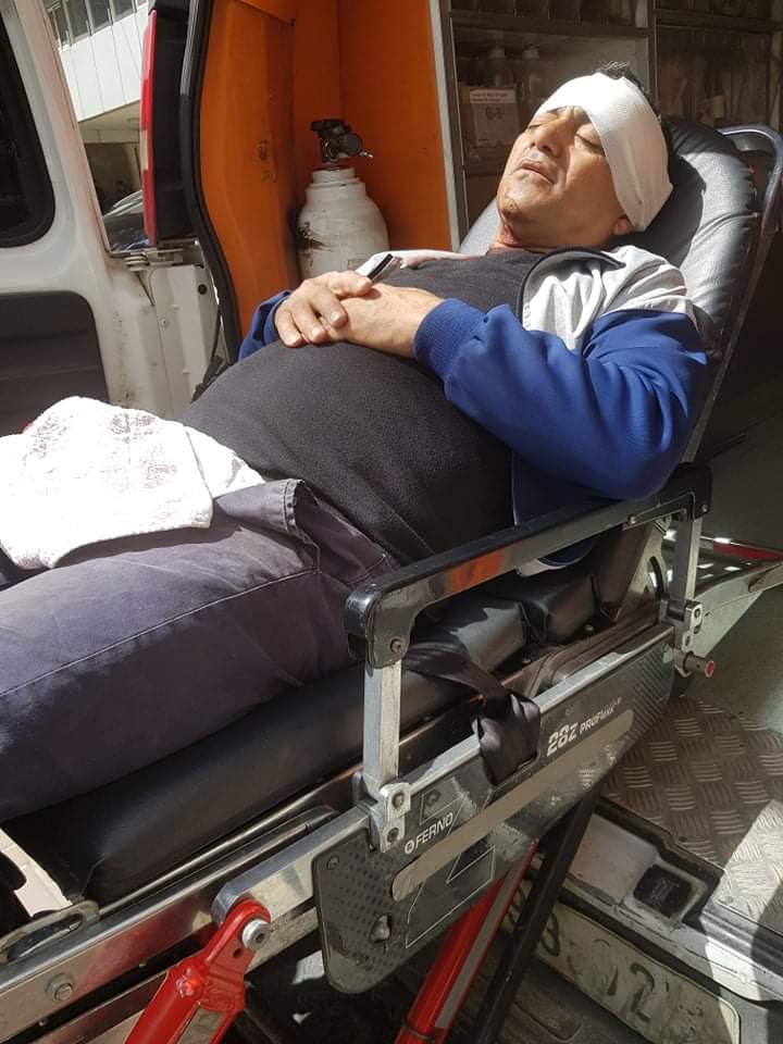 Naji Tanatra at the ambulance that evacuated him to the hospital.